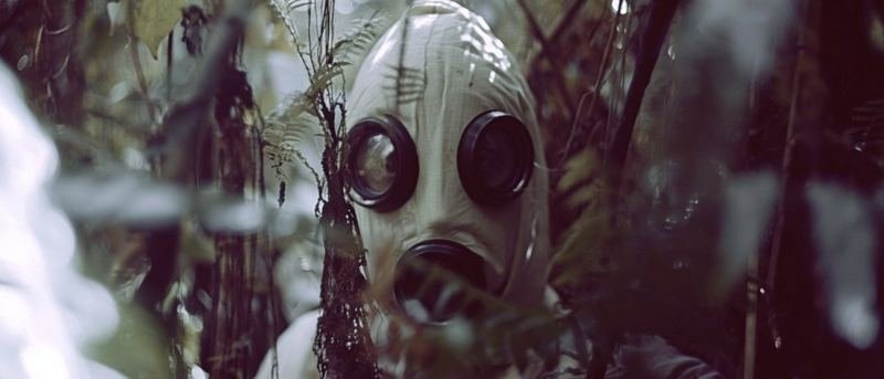 Masked figure — Uganda field photograph